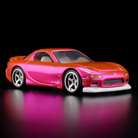 Hot Wheels RLC 1993 Mazda RX-7 R1 diecast in pink, front three-quarter view